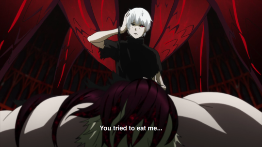 Kaneki, whose hair has now changed from black to wite, stands over the fallen Jason, supported by red extra limbs called kagune. He is saying 'You tried to eat me...'