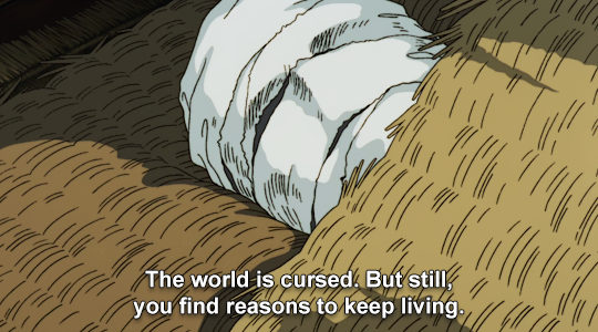 A person completely covered in rags, covered by a woven mat. 'The world is cursed. But still, you find reasons to keep living.'