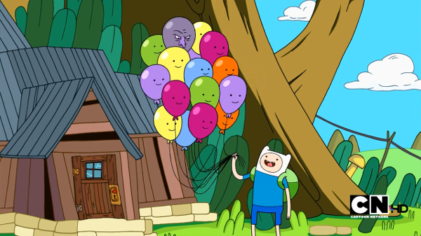 Finn holding a large bunch of balloons. Most are smiling, but one has a grumpy expression and a large nose.