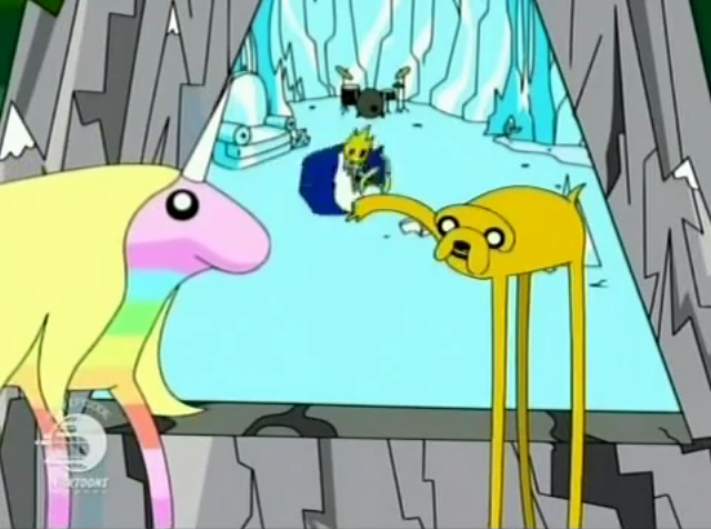 Jake flirts with 'Princess Bubblegum's Rainicorn', a long colourful unicorn character, while Pen wrestles the Ice King in the background, inside the Ice King's mountain. The Ice King is an old man with a long white beard and blue robe.