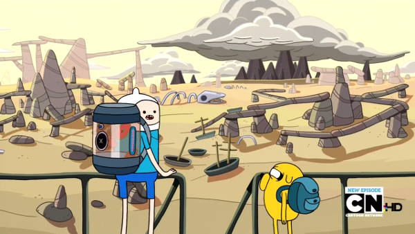 A desert of sharp brown rocks and enormous skeletons. In the foreground, Finn and Jake survey it. Finn has a cylindrical backpack in which tarts hover.