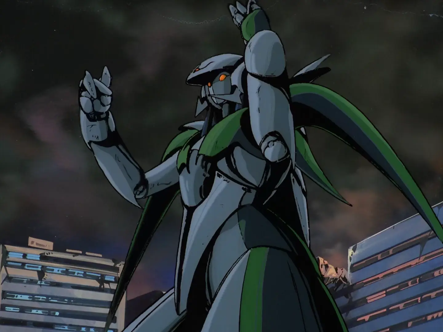 Still from Iczer One (1985). The robot Iczer One is shot from a low angle against a cloudy sky, its fists raised.