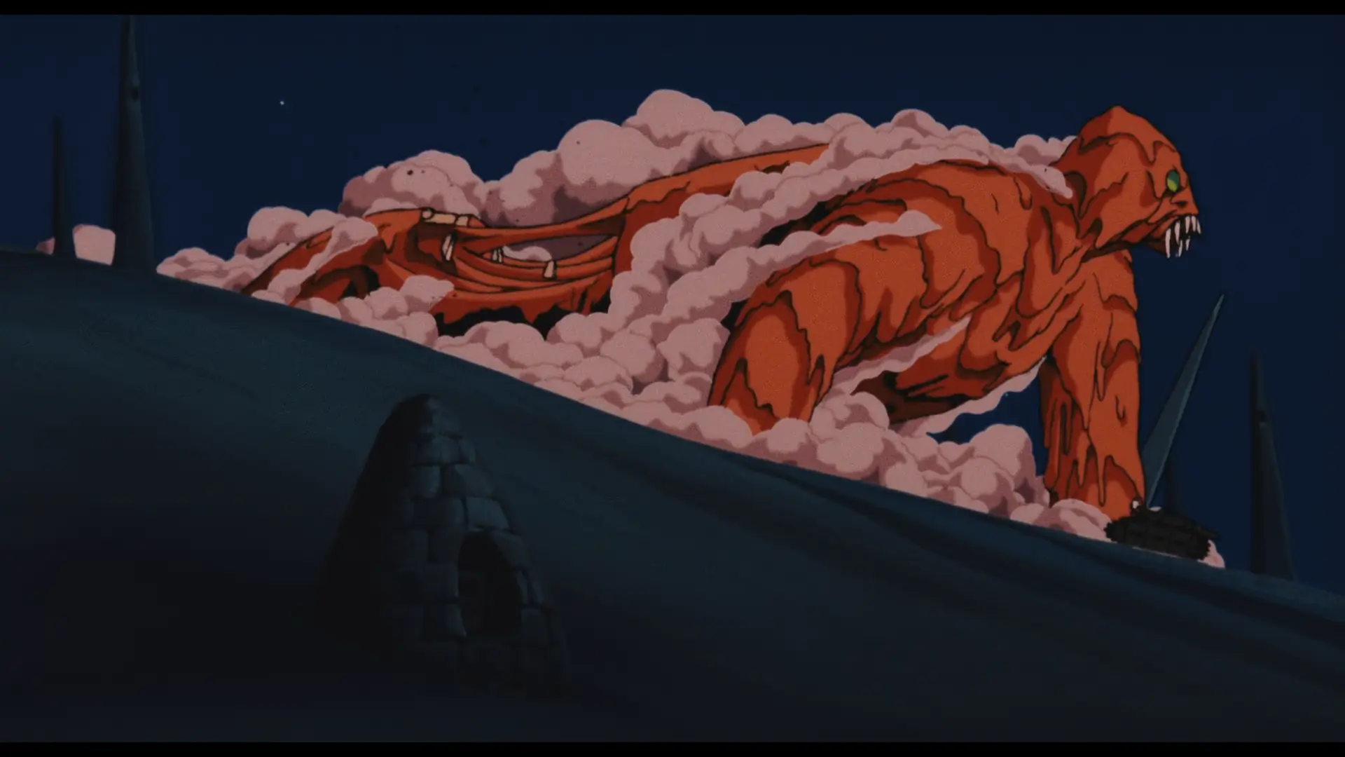 Still from Nausicaa of the Valley of the Wind (1984). The God Warrior, surrounded by clouds of steam and dripping melted flesh, crawls after Kushana's tank, tearing its torso away from its legs.