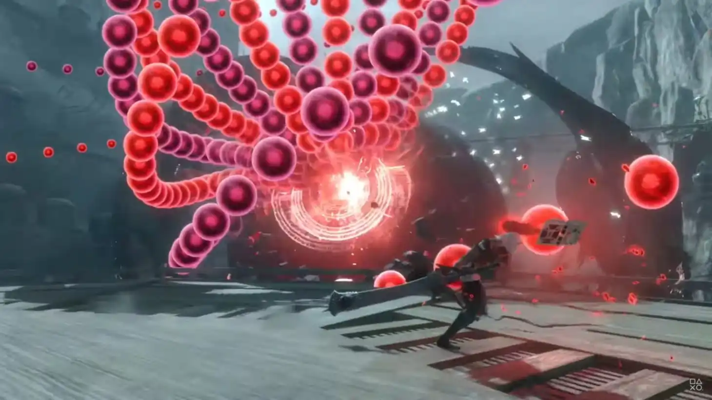 Screenshot from NieR Replicant. The player dodges through a curtain of red and purple bullets.
