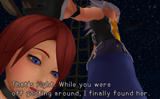 Kairi sitting at the bottom of the frame with a dull expression. Riku is saying 'That's right. While you were off goofing around, I finally found her.'