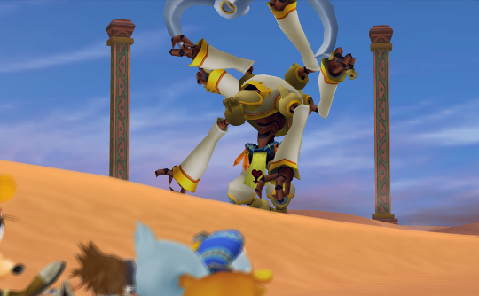 A desert area surrounded by pillars with an enormous white and gold Heartless robot holding gigantic curved swords in two of its six arms.