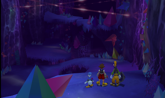 Sora, Donald and Goofy in a ravine lined with colourful crystals.