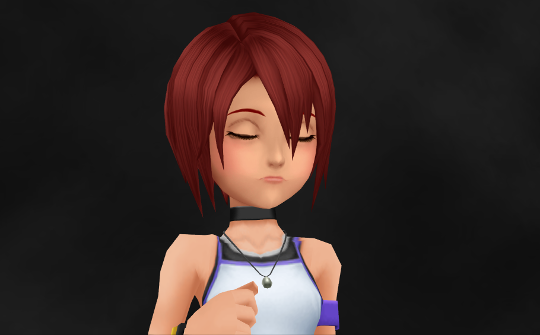 Kairi with her eyes shut in a dark void.