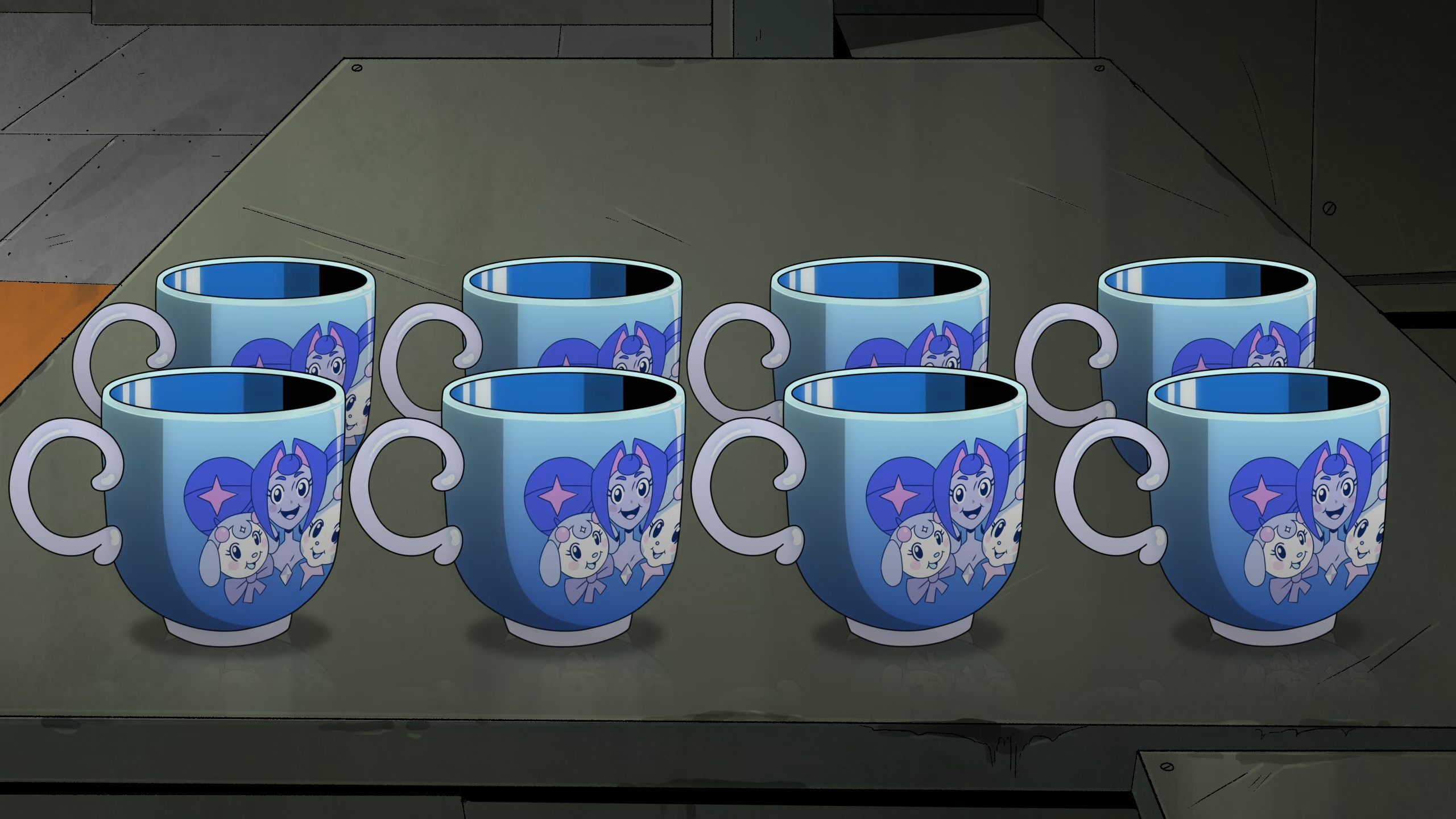 Cups stamped with a grinning Gwynevere.